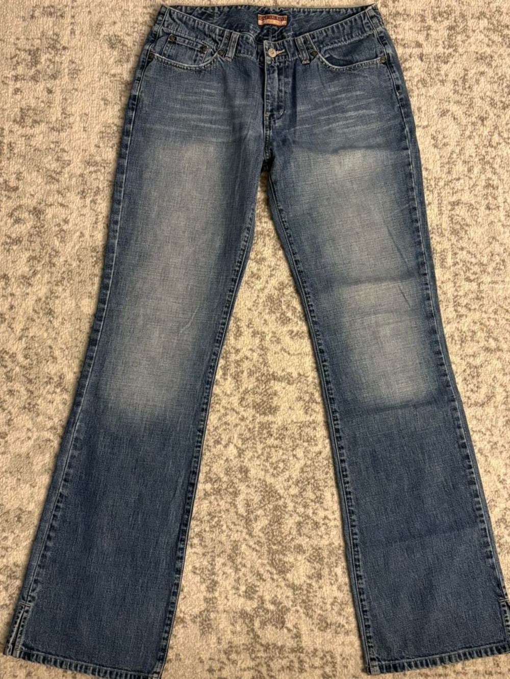Women’s BKE Vintage Denim Low Rise Flare Split Hem Blue Jeans

See Measurements